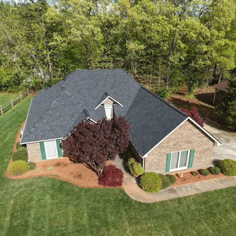 Mooresville roof replacement project showing a shingle-roofed home from above.