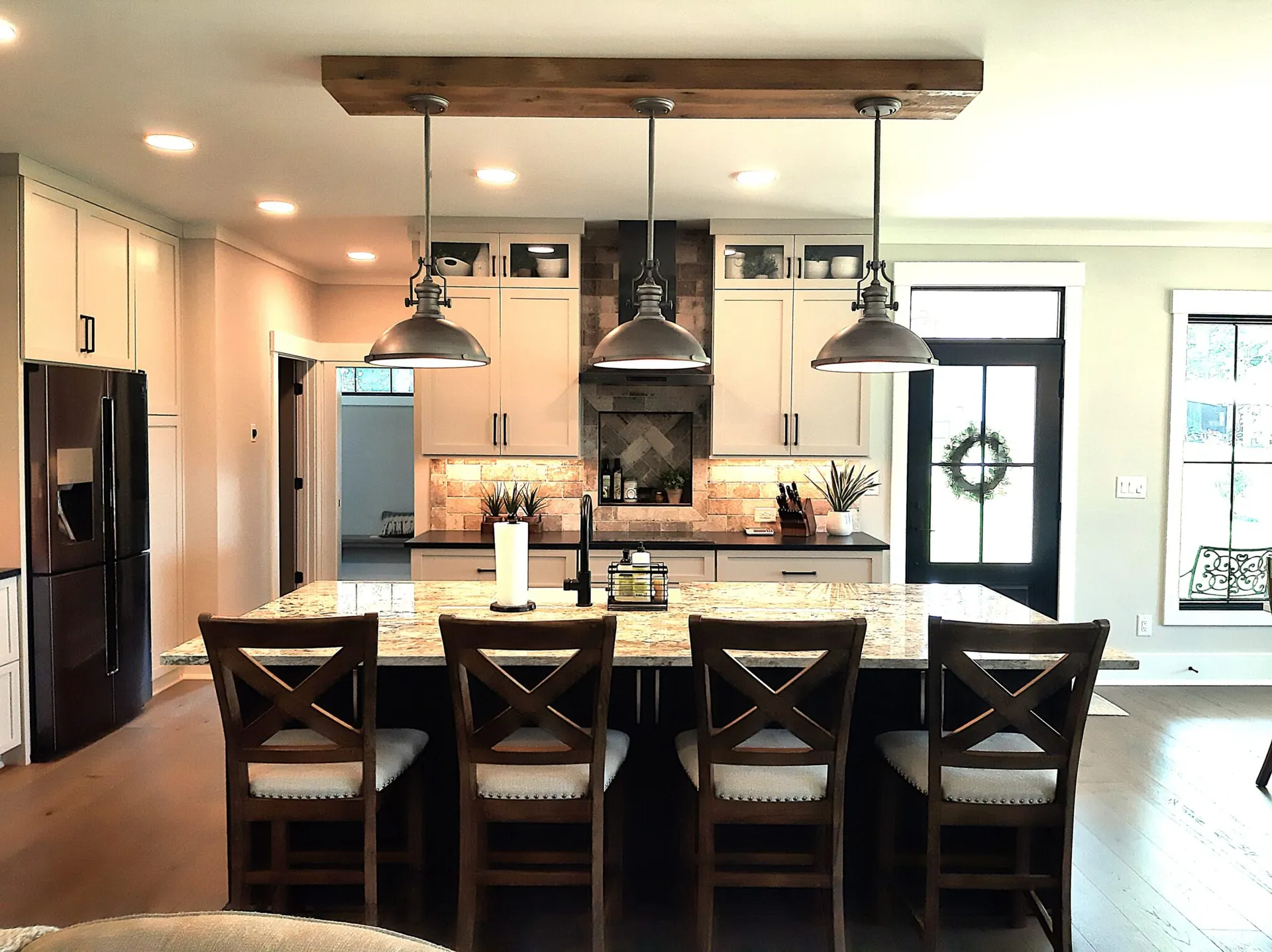 Interior construction framing visible inside a custom home.